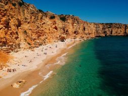 Beautiful view of a sandy beach under the cliff Beautiful view of a sandy beach under the cliff